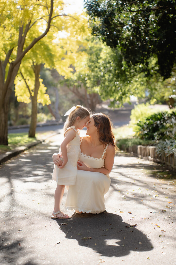 Breeanna embracing her daughter at Leachwood Gardens family session
