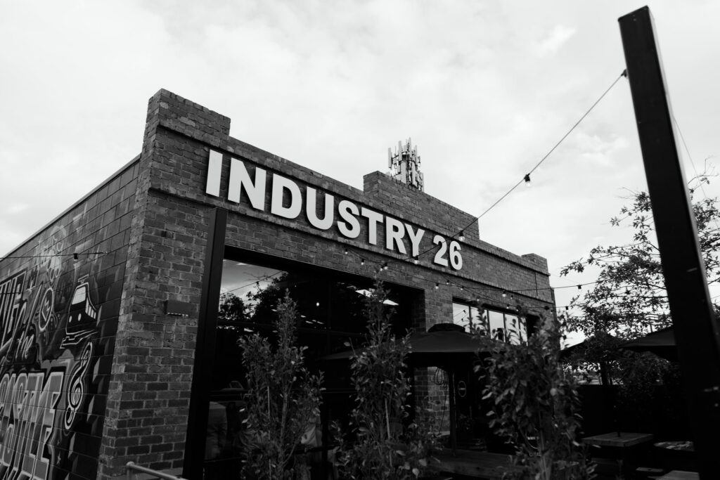 Black and white photo of Industry26 signage at Geelong wedding reception