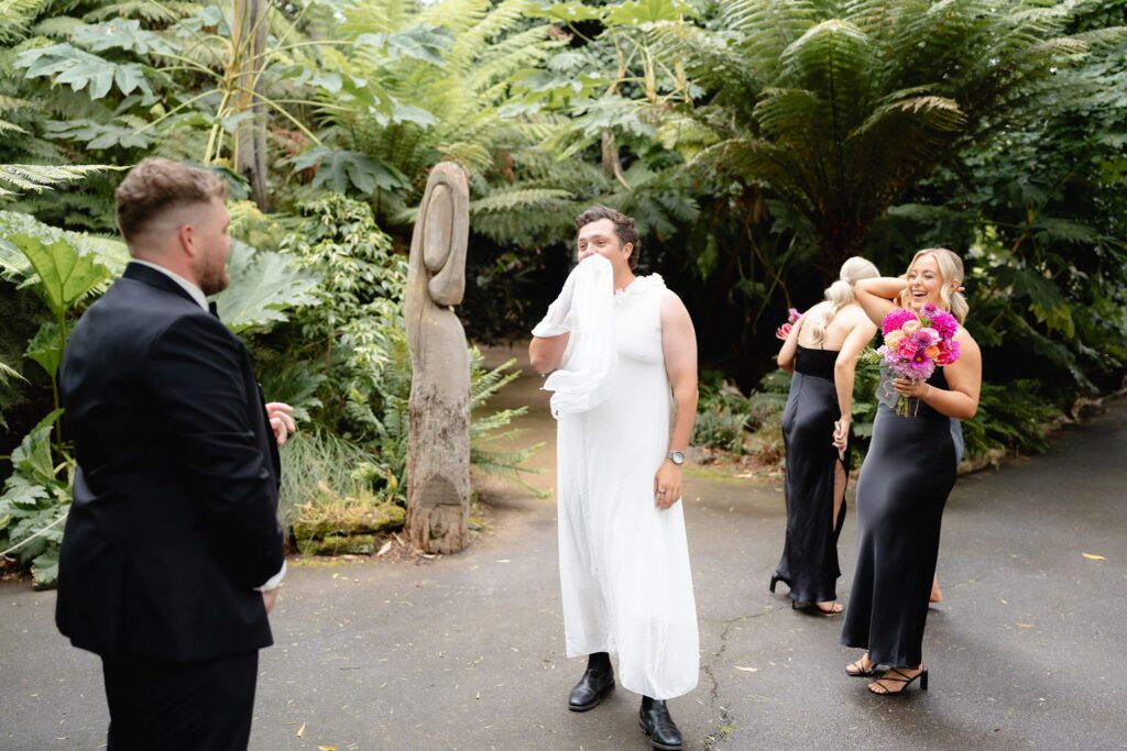 Groom's reaction during fake first look at Geelong Botanic Gardens wedding