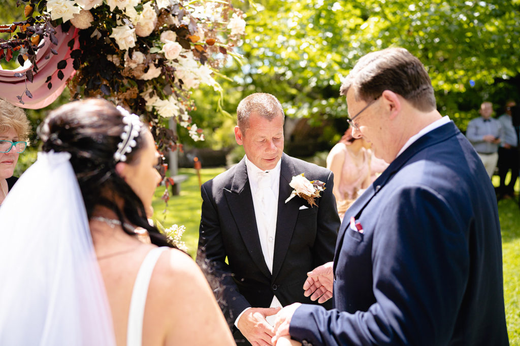 The Groom receives his Bride at their Batesford Hotel Wedding